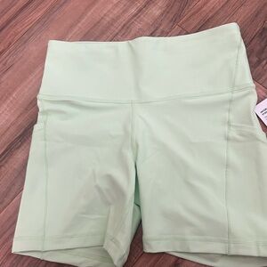 Athleta Interval stash” Light Green shorts Women's Athletic